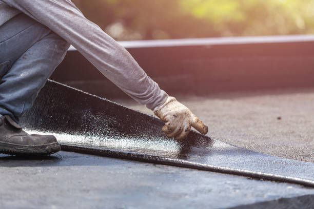 Professional Interior Drainage System technician working in Farmingville, NY